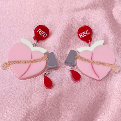 Peachfuzz Creep Earrings