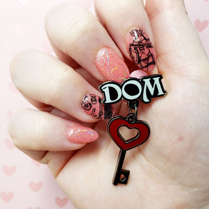 DOM Kinked Love enamel pin